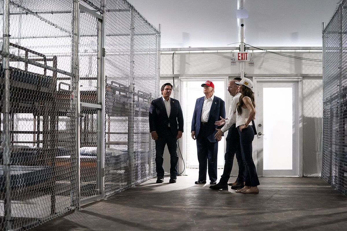 Trump, DeSantis and Noem tour cages of bunk beds at the “Alligator Alcatraz” detention site in the Florida Everglades, July 1, 2025.